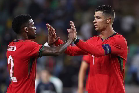 Cristiano Ronaldo and Nelson Semedo